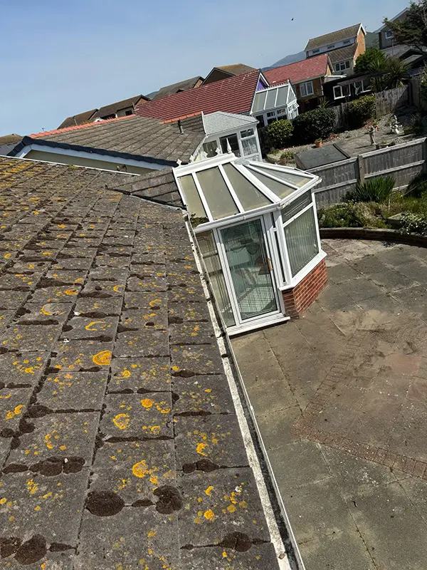 Rickard Cleaning Services pressure washing a Gutter or fascia