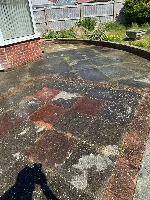 Shows driveway or patio prior to being cleaned by Riackrd Cleaning Services