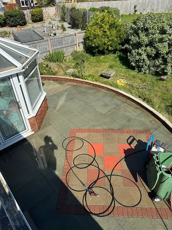 Shows driveway or patio prior to being cleaned by Riackrd Cleaning Services